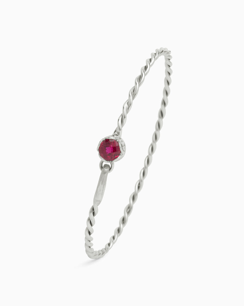 Princess Petroglyph Twisted Bangle - Red Zircon