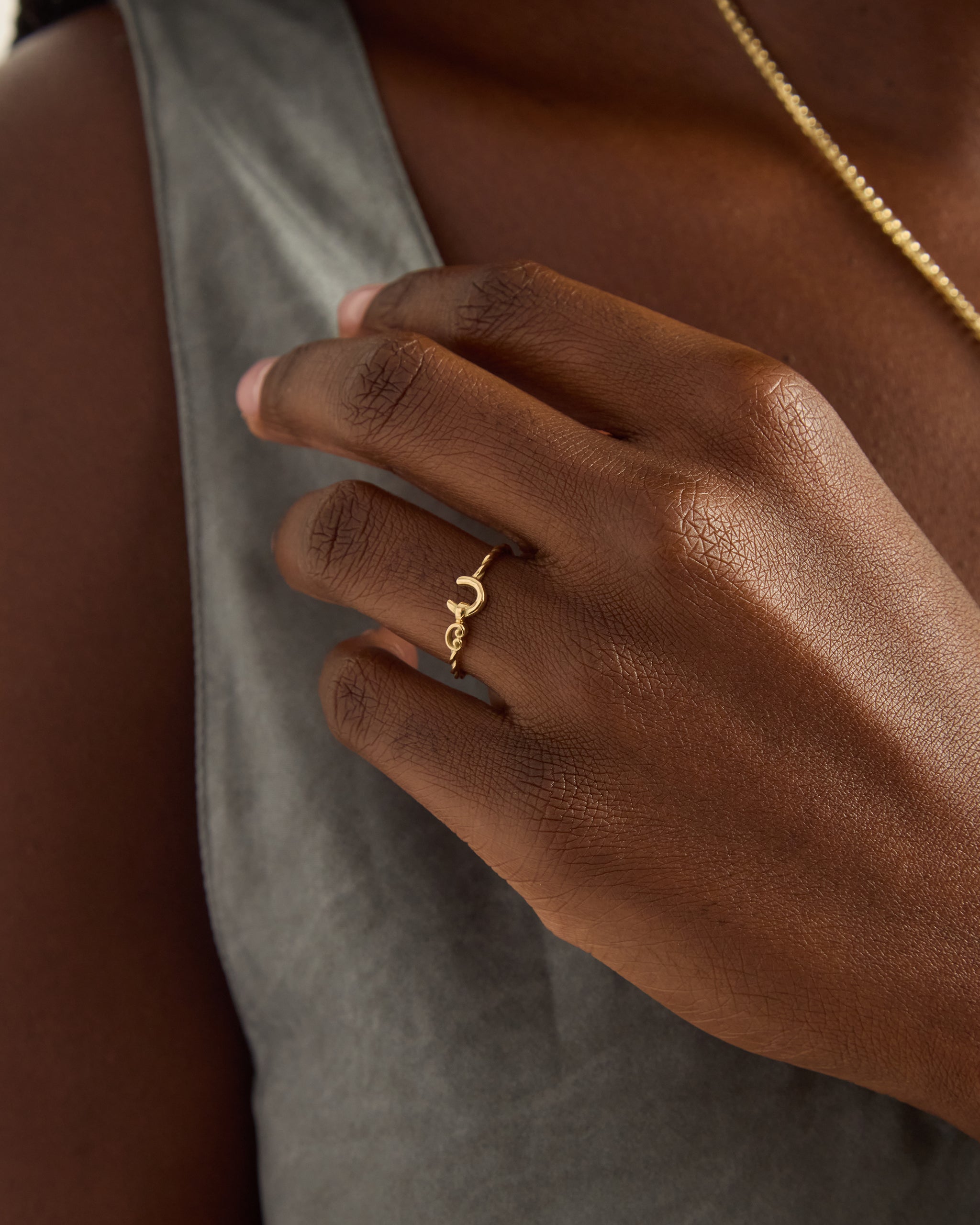 14K Gold Twisted Hook Ring with Open Petroglyph
